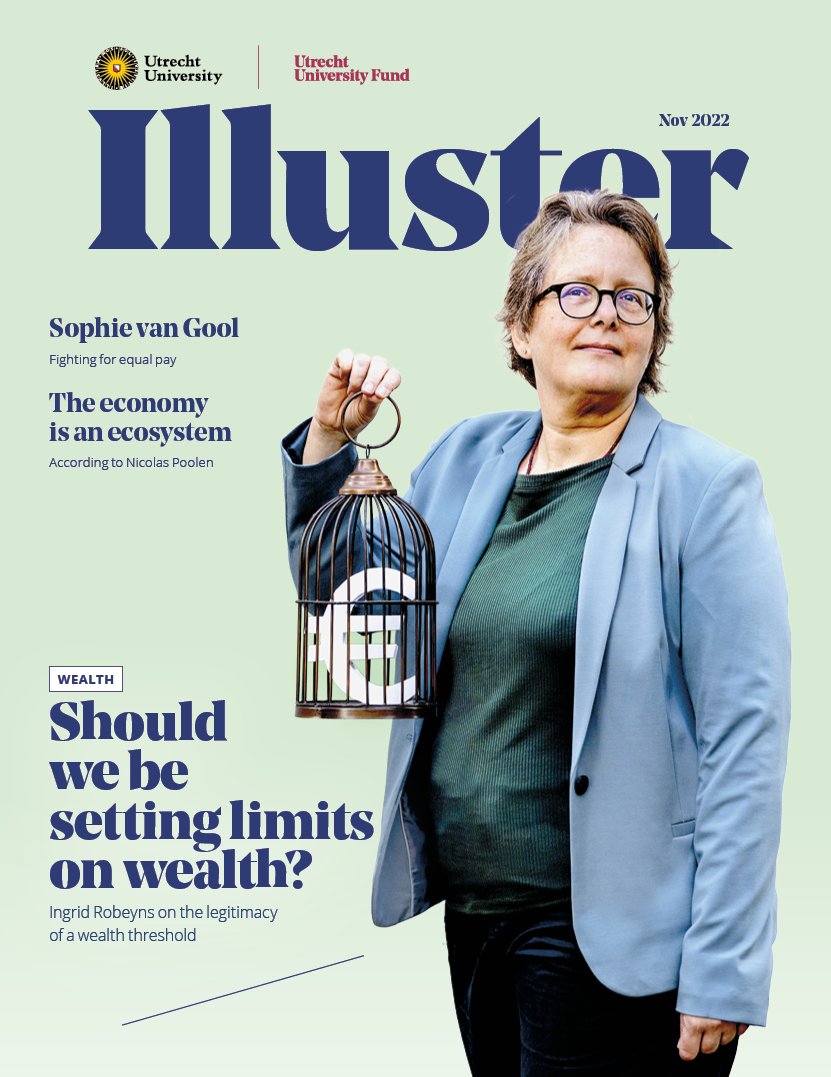 Cover of alumni magazine Illuster about money, November 2022. Professor Ingrid Robeyns is portraited holding a small bird cage with a Euro sign inside.
