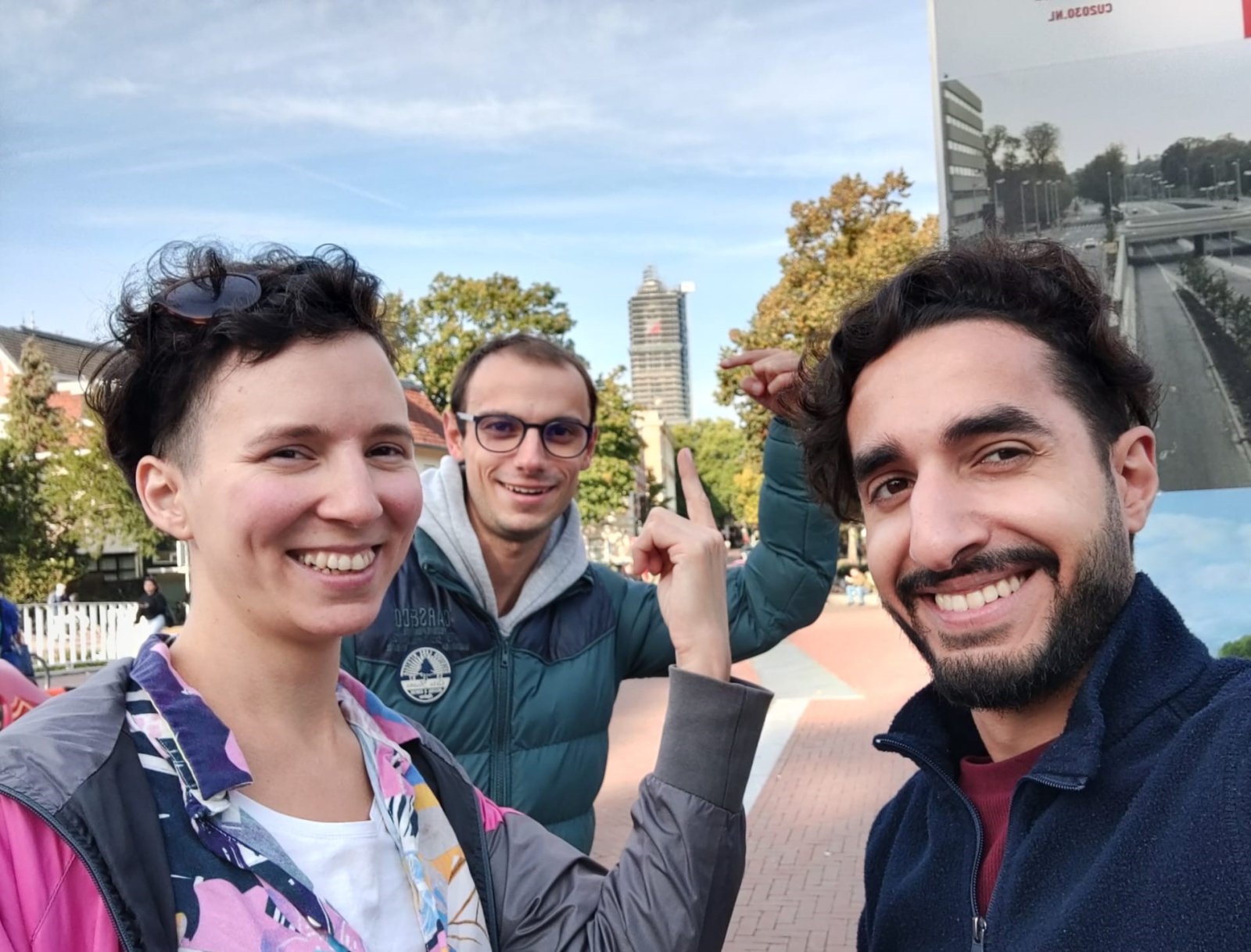 Three students during the event Utrecht Photo Hunt took a selfie with the Dom tower