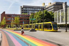 Rainbow cycling path and tram Utrecht Science Park