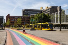 Utrecht Science Park with buildings, rainbow bike path and tram