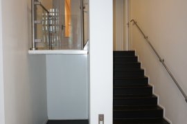 Stairs in the David de Wied building with wheelchair lift