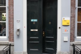 The main entrance doors of Trans 10