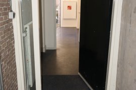 The door leading from the alternative entrance into the building at Trans 10