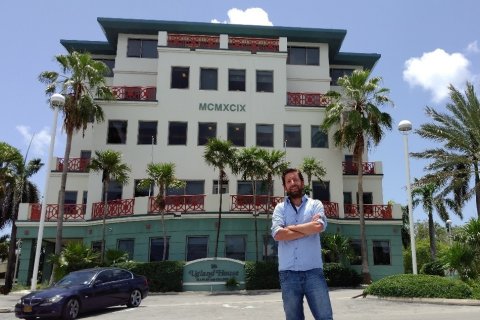 Joras Ferwerda in front of Ugland House on the Cayman Islands