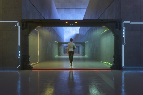 Woman in an empty, futuristic hallway