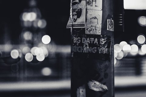 Big data is watching you sticker on pole (photo: Unsplash)
